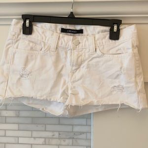 J brand cut off white denim shorts 25